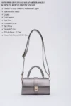 کیف زنانه چرم مصنوعی دست، بازو و شانه نقره ای Shk109 با بست و بند قابل تنظیم L:11 E:19 W:7 سانتی متر - 2445