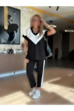 ست بلوز و شلوار دو تکه زنانه با یقه V و آستین کوتاه از ویسکوز، رنگین و مناسب برای فصل جدید. - 7166