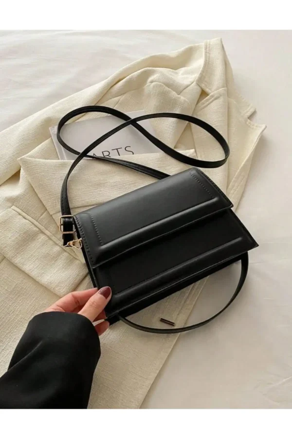 کیف چرم زنانه با طراحی شیک و بند دوشی - 6964