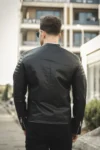 کاپشن چرم مردانه اورست با فیت بسیار باریک و آستری پُلاستیک، دکمه‌دار در قسمت جلو و دوخت سینه‌ای - 7251
