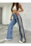 شلوار جین زنانه با کمر بالا، طرح لئوپارد آبی و نوار کناری عریض - 7438
