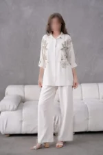 بلوز و شلوار کتان زنانه با طرح گل‌دار و گلدوزی شده، اورسایز - 7163