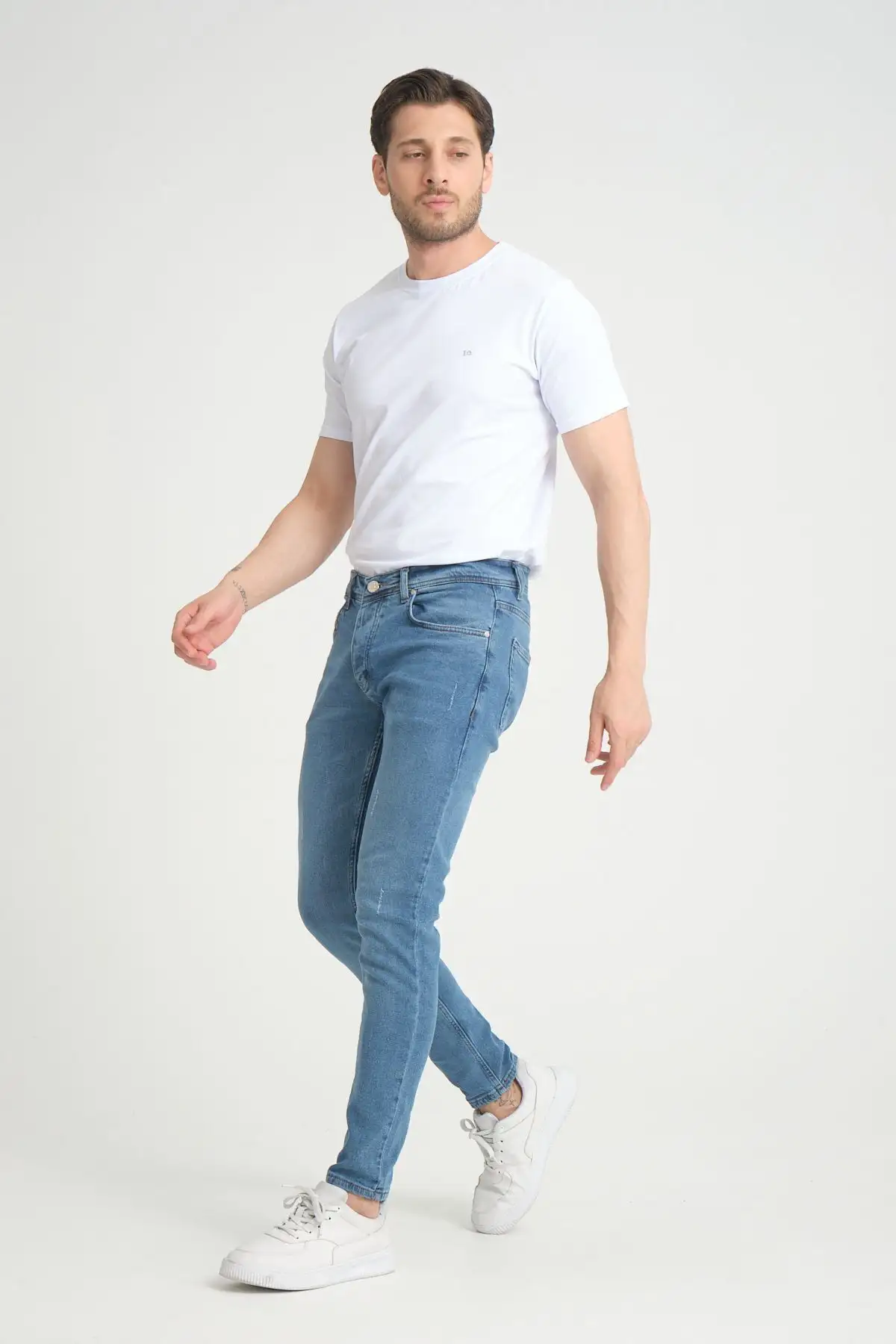 شلوار جین مردانه درجه متوسط آبی روشن مدل اسکینی فیت