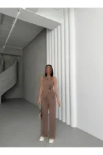 ست لباس زنانه با پارچهٔ براق و برش نامتقارن، شامل شلوار و تاپ - 8222