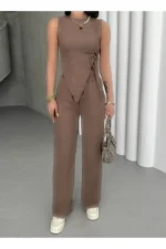 ست لباس زنانه با پارچهٔ براق و برش نامتقارن، شامل شلوار و تاپ - 8222