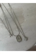 ست گردنبند سه‌گانه از جنس فولاد ضد زنگ 316L با روکش رودیوم، شامل طرح مدل شبدر و ستاره دریایی - 7642