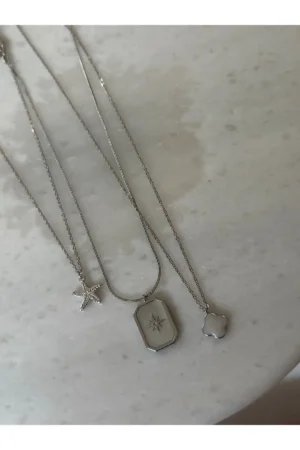 ست گردنبند سه‌گانه از جنس فولاد ضد زنگ 316L با روکش رودیوم، شامل طرح مدل شبدر و ستاره دریایی - 7642