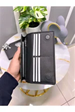 کیف پول چرمی اصلی با بخش تلفن - دارای مگنت و بند دستی - رنگ مشکی - بزرگ 2028 - 8478