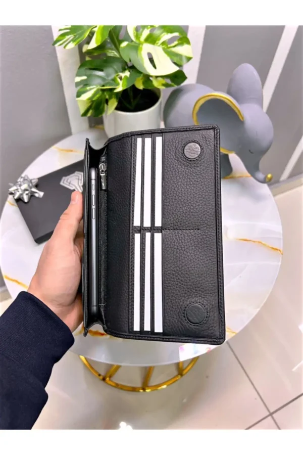 کیف پول چرمی اصلی با بخش تلفن - دارای مگنت و بند دستی - رنگ مشکی - بزرگ 2028 - 8478
