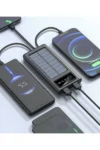 پاوربانک خورشیدی ۲۰۰۰۰ میلی‌آمپری با چراغ‌های LED و دو خروجی USB دارای چندین کابل - 9673