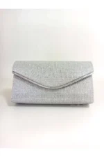 کیف مهمانی زنانه با حاشیه نقره‌ای و شانزده‌ی براق - 9352
