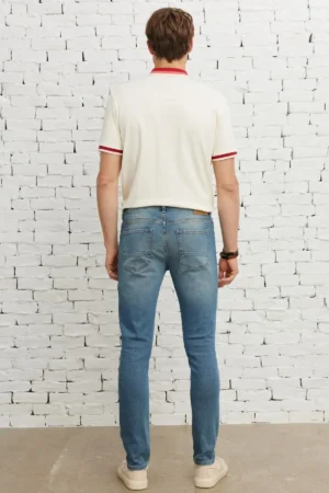 شلوار جین دنیم پنبه‌ای مردانه با رنگ آبی نفتی، برش اسلیم فیت و کشسانی EXTRA Slim Fit - 9515