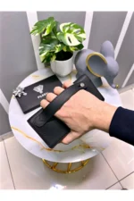 کیف پول چرمی اصلی با بخش تلفن - دارای مگنت و بند دستی - رنگ مشکی - بزرگ 2028 - 8478