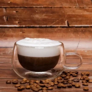 ما mug شیشه‌ای دو جداره با عایق حرارتی و دسته، مناسب برای منزل و دفتر کار، حجم ۲۵۰ میلی‌لیتر را به نام "فنجان شیشه‌ای دو جداره ۲۵۰ میلی‌لیتر" ترجمه می‌کنم. - 10323