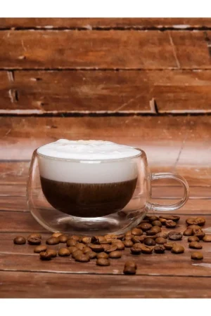 ما mug شیشه‌ای دو جداره با عایق حرارتی و دسته، مناسب برای منزل و دفتر کار، حجم ۲۵۰ میلی‌لیتر را به نام "فنجان شیشه‌ای دو جداره ۲۵۰ میلی‌لیتر" ترجمه می‌کنم. - 10323