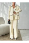 ست بافتنی زنانه شامل کت دکمه‌دار و شلوار دوخته شده، رنگ کرم - 11150