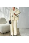 ست بافتنی زنانه شامل کت دکمه‌دار و شلوار دوخته شده، رنگ کرم - 11150