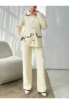 ست بافتنی زنانه شامل کت دکمه‌دار و شلوار دوخته شده، رنگ کرم - 11150