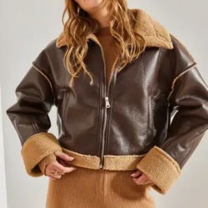 کت چرم زنانه با آستری پشمی و جیب‌های کناری ترک