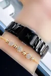 ساعت مچی زنانه با بند استیل مشکی و دستبند هدیه - مدل DKBH3940 - 12136
