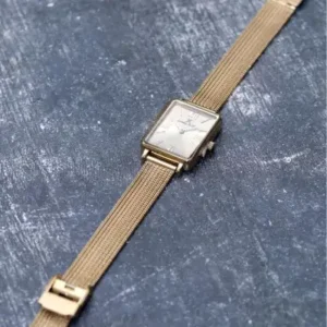 ساعت مچی زنانه طرح مینیمال با بند حصیری و بدنه مستطیلی مدل Dke.1.10741 - 12130