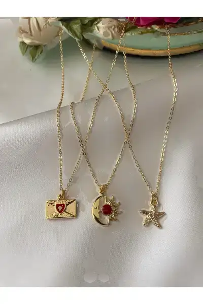 ست گردنبند نماد سه تایی با روکش طلا - 12063 ست گردنبند نماد سه تایی با روکش طلا - 12063