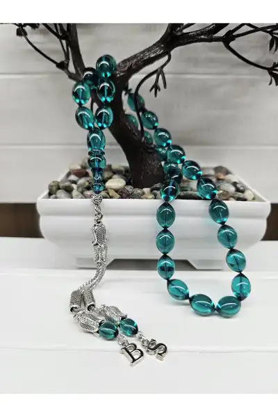 تسبيح کهربا با جزئیات کار شده نقره تسبيح کهربا با جزئیات کار شده نقره