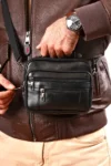 کیف دستی و دوشی مردانه مدل افقی مشکی با قاب فلزی از چرم طبیعی سایز متوسط - 13633