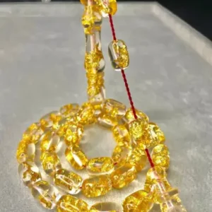 تسبیح طلای 24 عیار با ذرات طلایی و جعبه چوبی طراحی شده ویژه - 13333